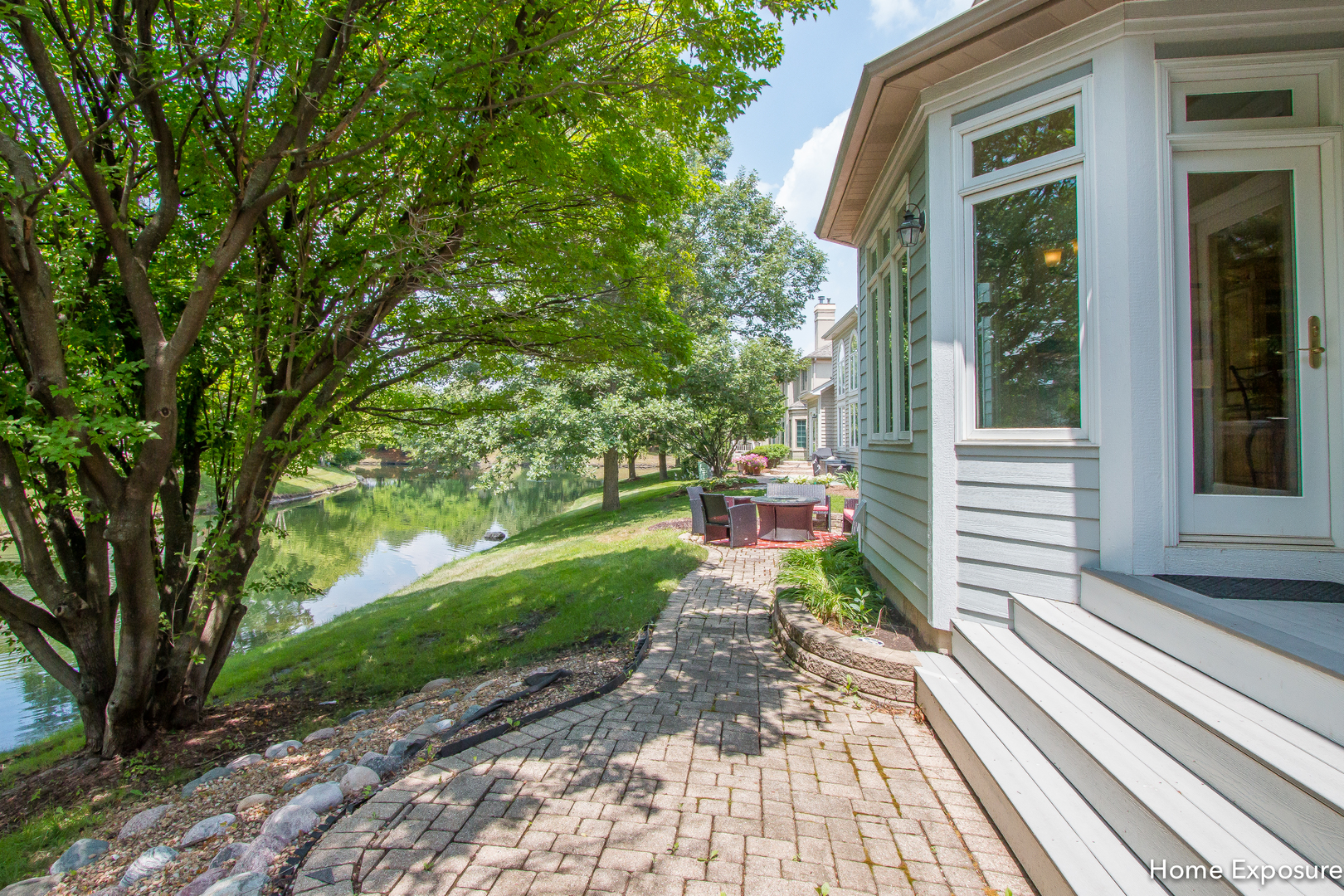 2552 Sutton Lane Aurora, IL 60502 - Photo 44 of 57 a front view of a house with a yard