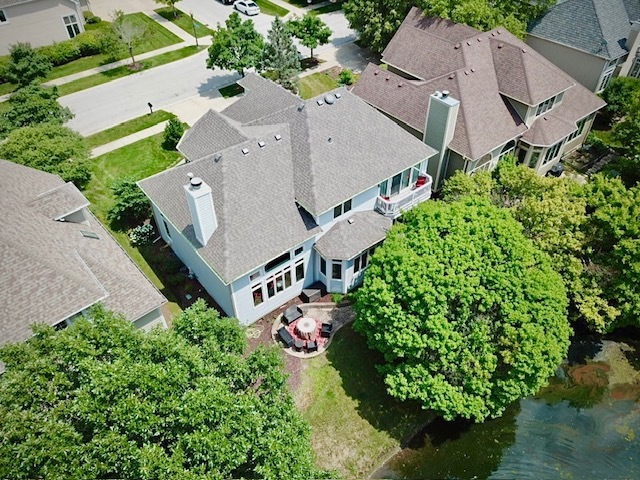 2552 Sutton Lane Aurora, IL 60502 - Photo 47 of 57 an aerial view of a house with a garden