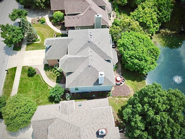 2552 Sutton Lane Aurora, IL 60502 - Photo 48 of 57 an aerial view of a house with a yard and garden