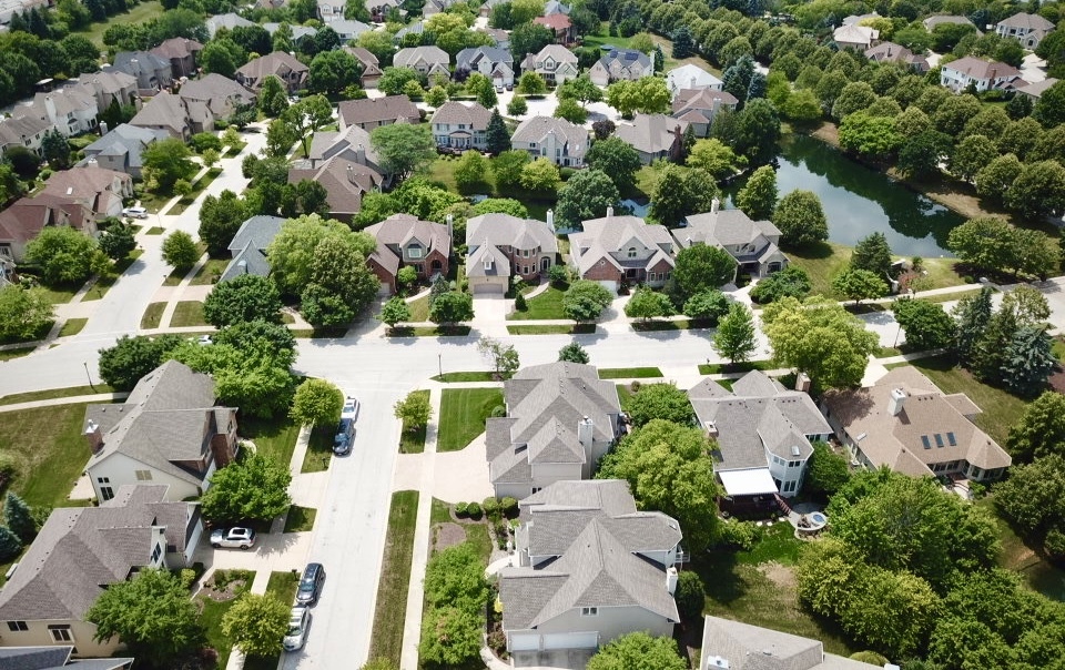 2552 Sutton Lane Aurora, IL 60502 - Photo 53 of 57 an aerial view of residential houses with outdoor space and trees