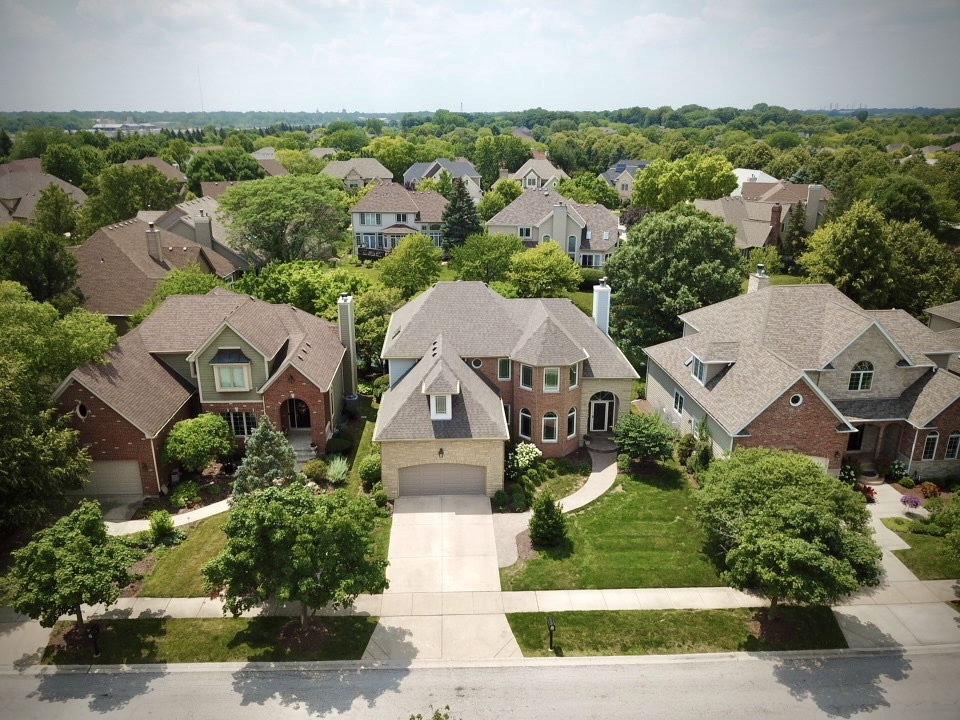 2552 Sutton Lane Aurora, IL 60502 - Photo 54 of 57 an aerial view of houses with yard