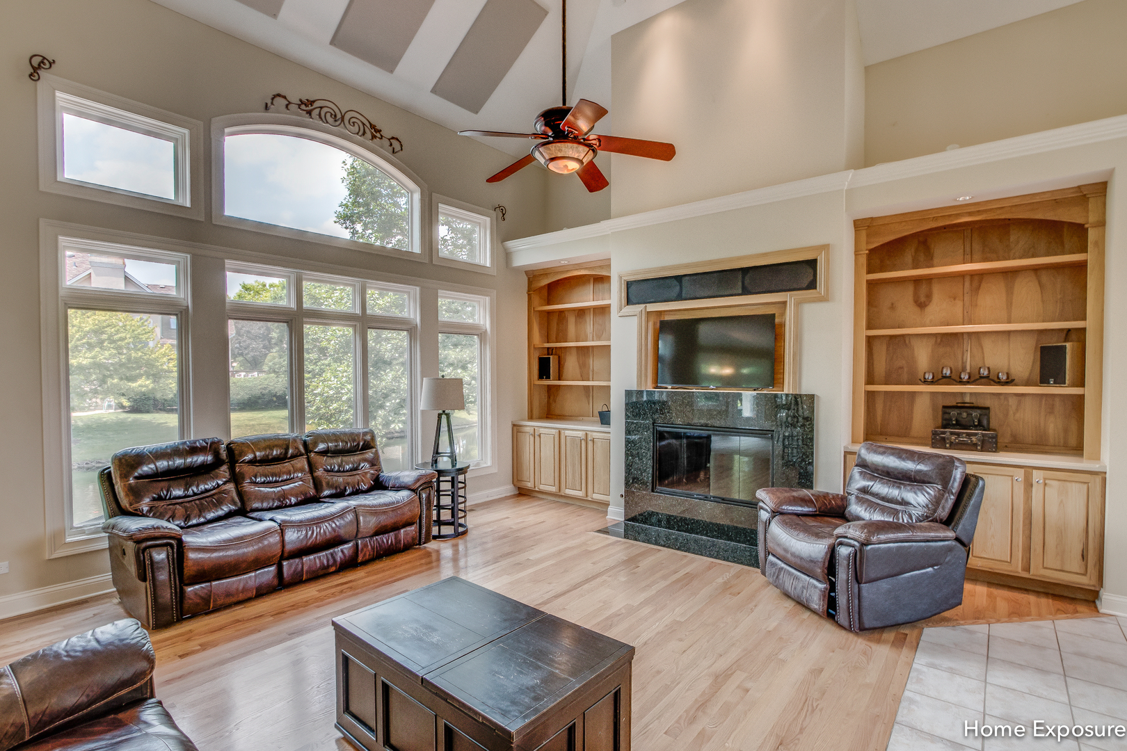 2552 Sutton Lane Aurora, IL 60502 - Photo 8 of 57 a living room with furniture fireplace and flat screen tv