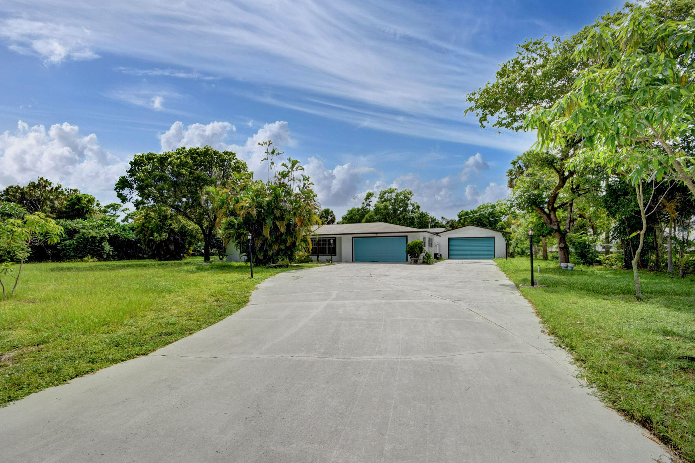 1321 Ranchette Road Greenacres, FL 33415 - Photo 1 of 56 FRONT