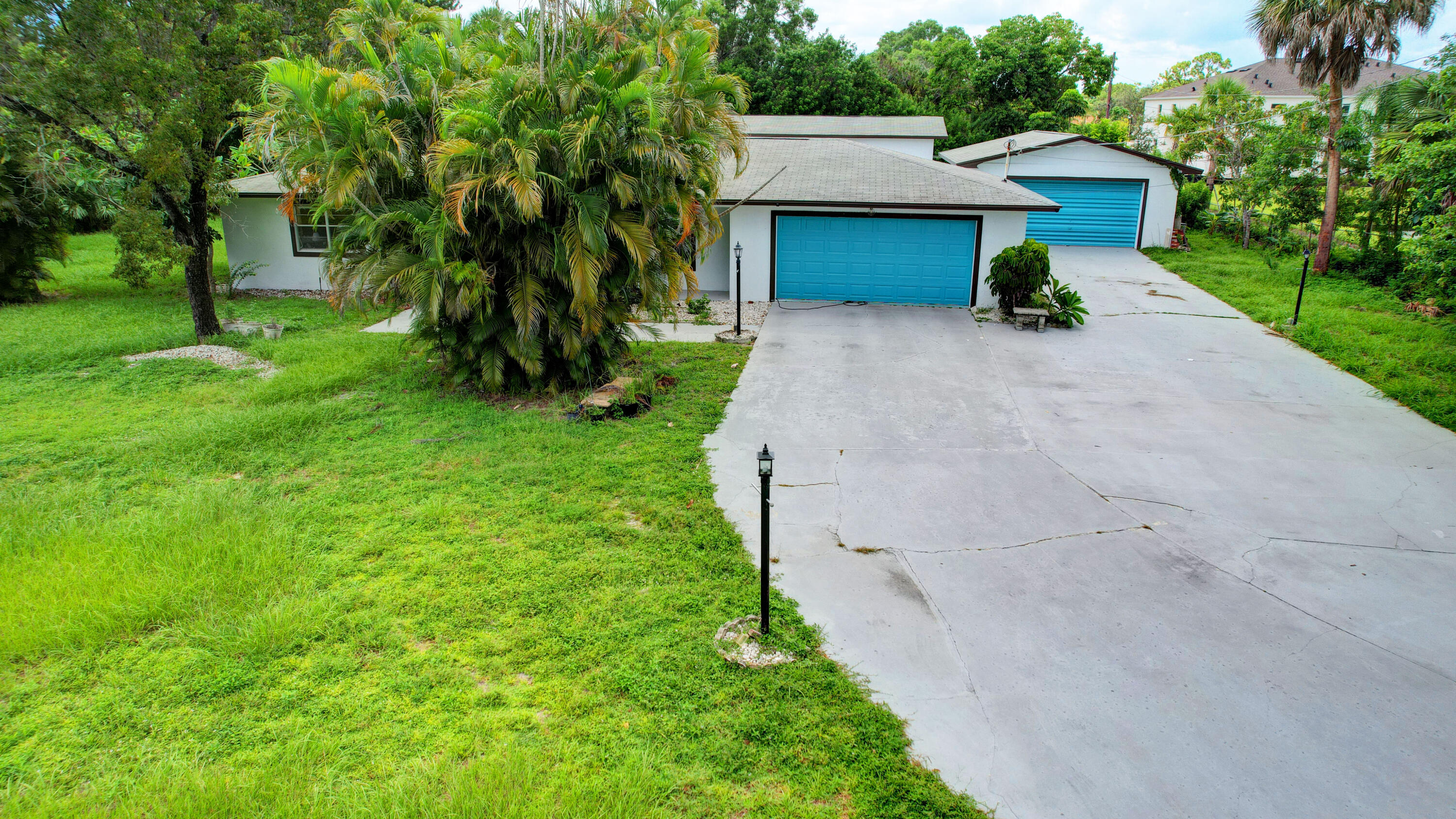 1321 Ranchette Road Greenacres, FL 33415 - Photo 43 of 56 43_house air (1)