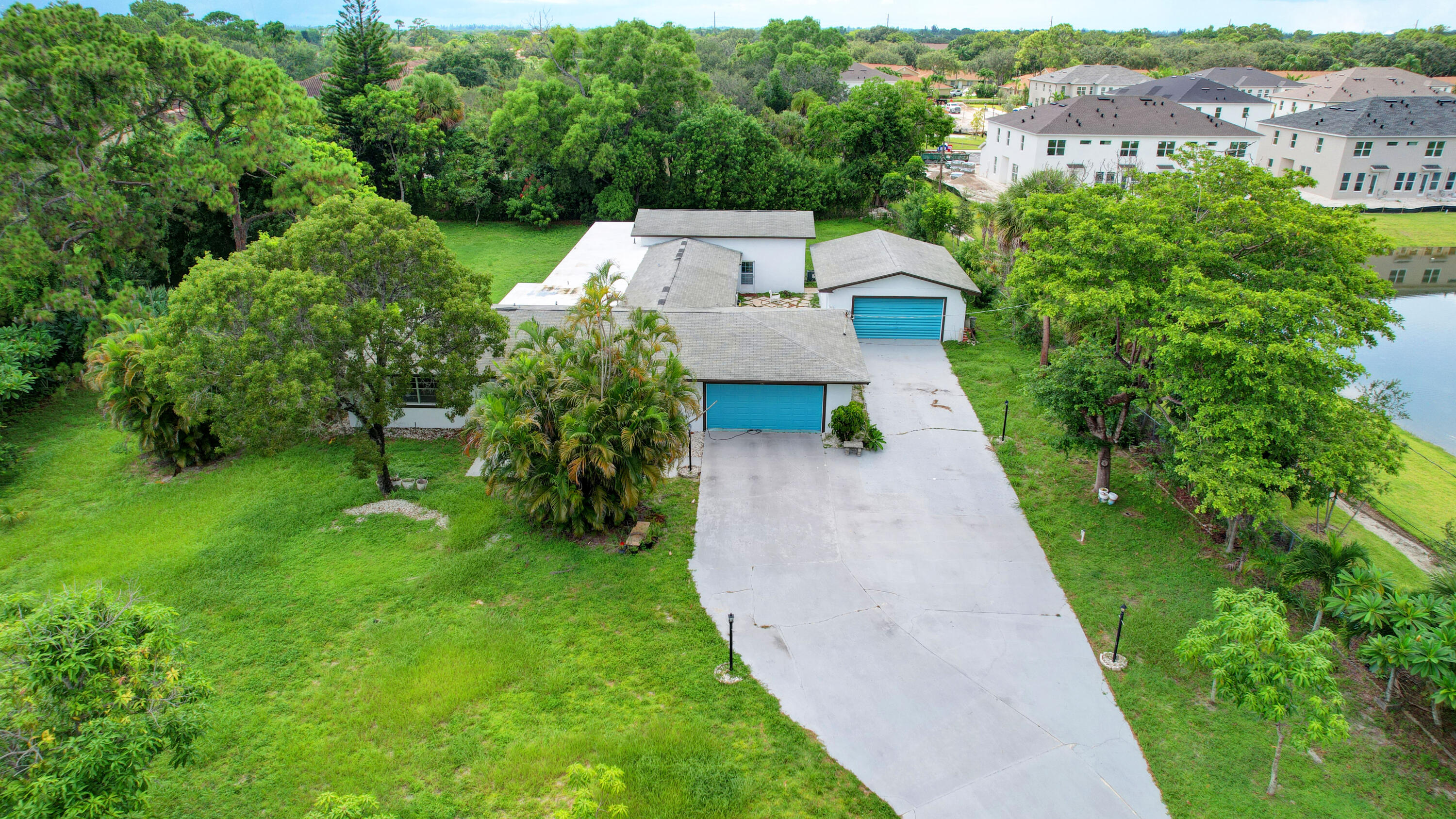 1321 Ranchette Road Greenacres, FL 33415 - Photo 44 of 56 44_house air (2)