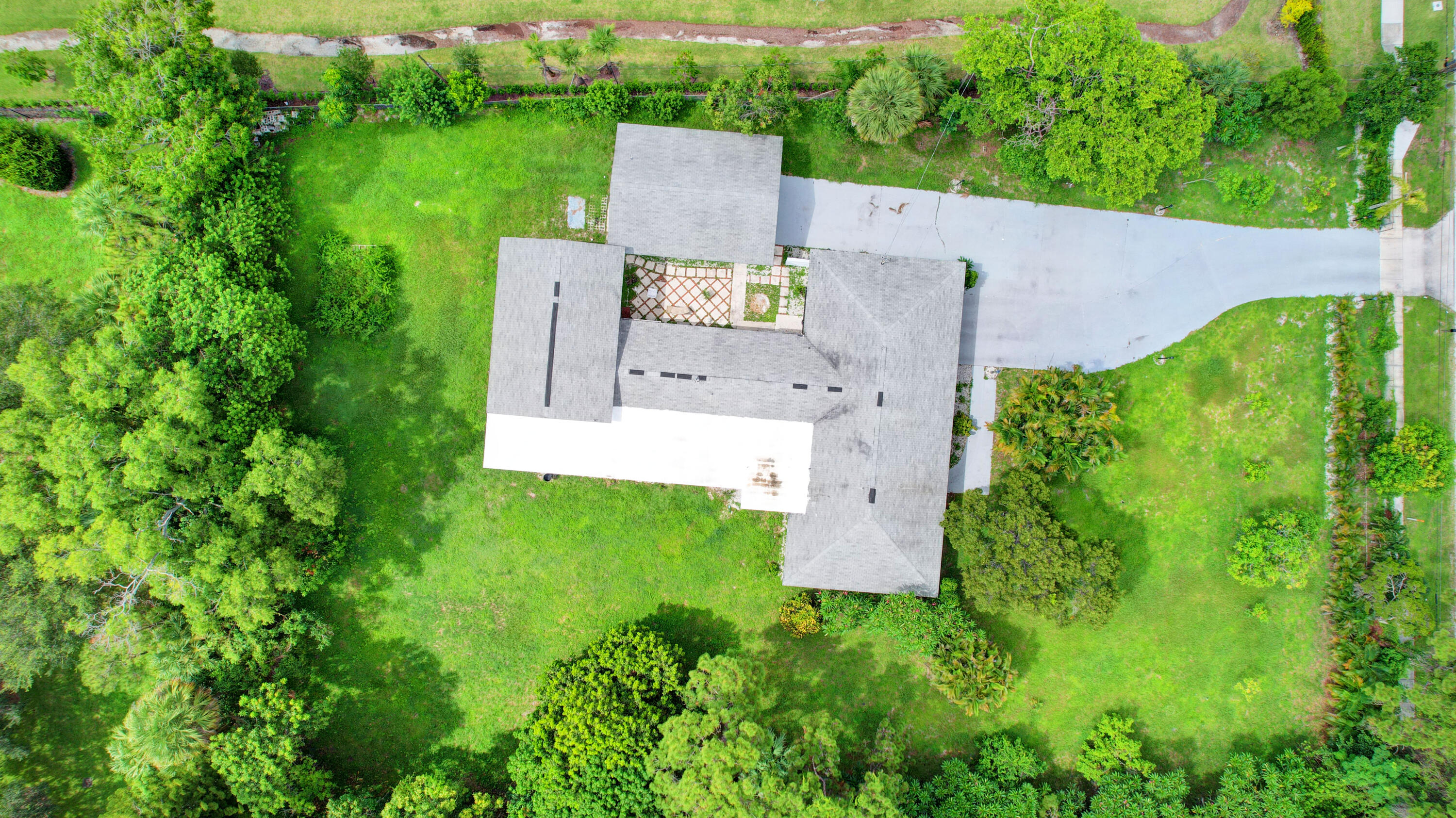 1321 Ranchette Road Greenacres, FL 33415 - Photo 52 of 56 52_house air (10)