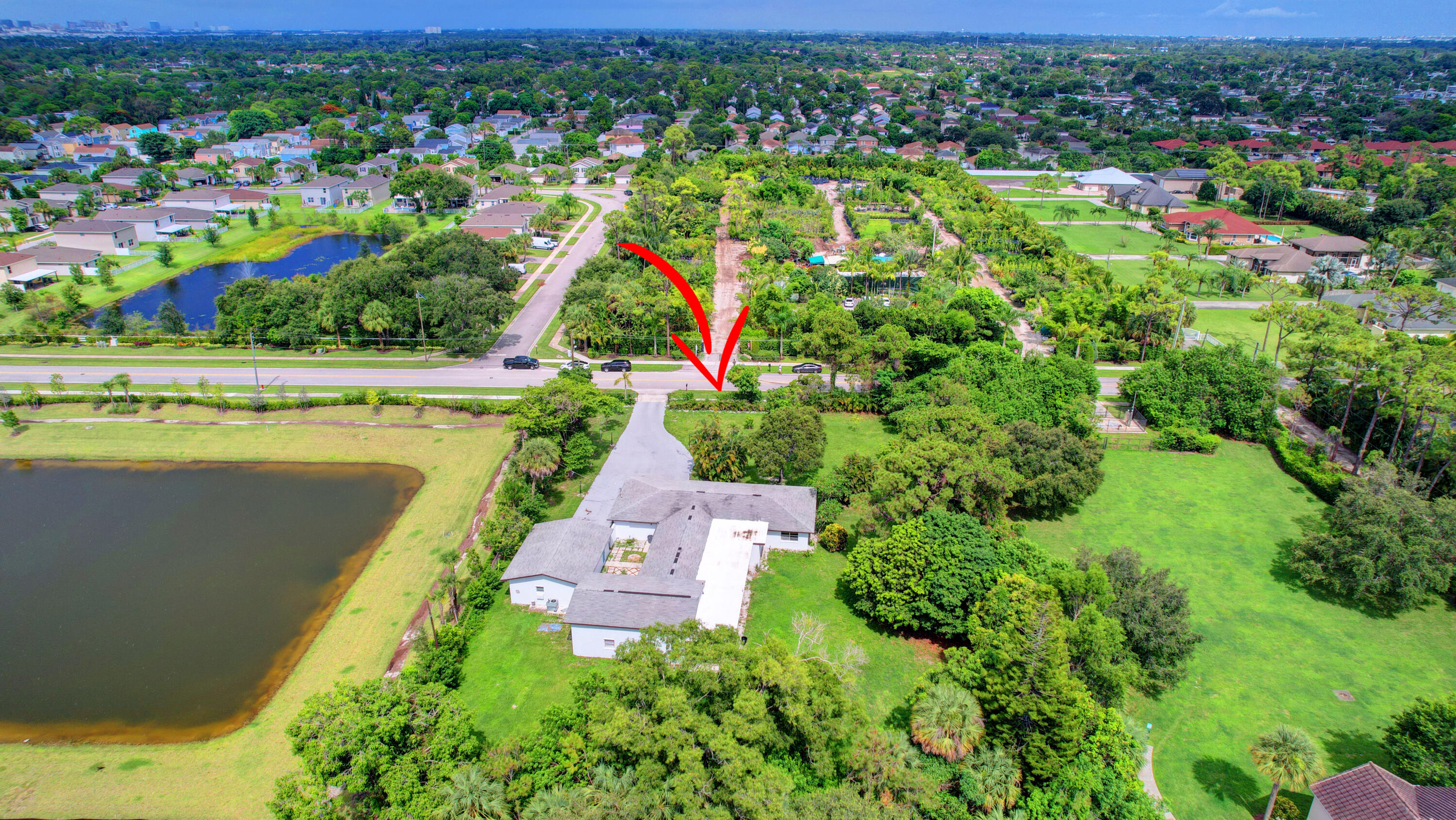 1321 Ranchette Road Greenacres, FL 33415 - Photo 55 of 56 55_house air (13)