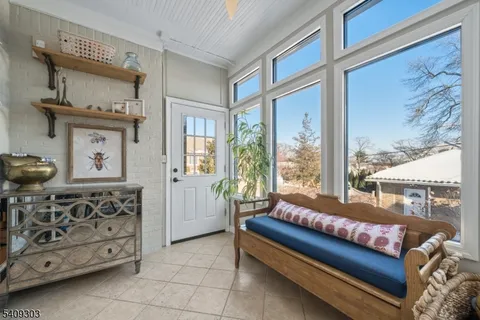 a bathroom with a sink a toilet and shower curtain
