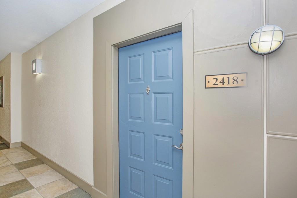 400 17th Street Northwest, Unit 2418 Atlanta, GA 30363 - Photo 1 of 1 a view of a hallway with wooden floor