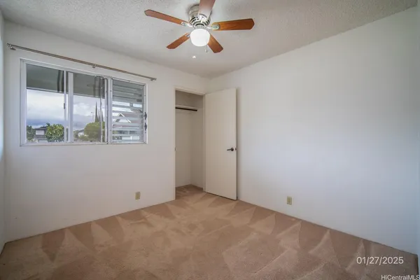 a view of a window in an empty room