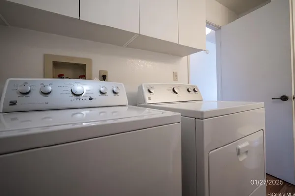 a utility room with dryer and washer