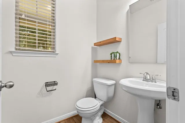 a bathroom with a sink and a toilet