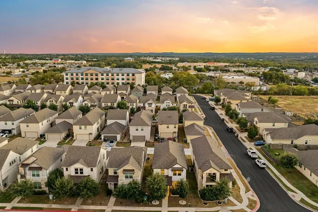 an aerial view of multiple houses