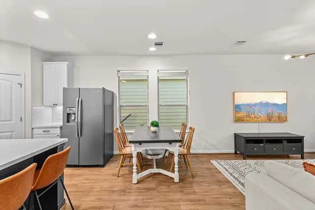 a workspace with furniture and window