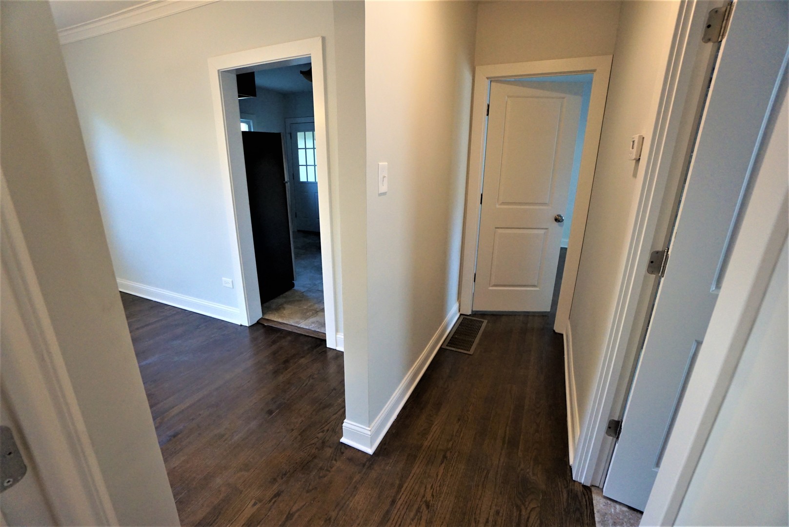 2224 Foster Street Evanston, IL 60201 - Photo 13 of 39 a view of a hallway with wooden floor