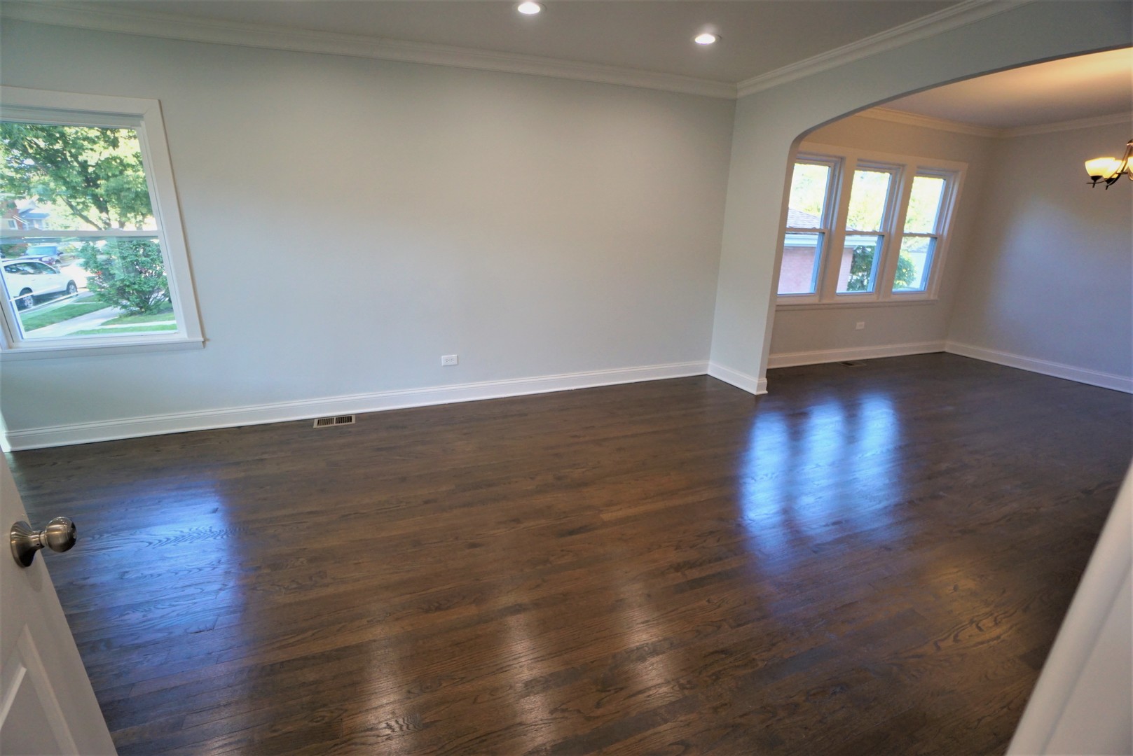 2224 Foster Street Evanston, IL 60201 - Photo 3 of 39 an empty room with wooden floor and windows