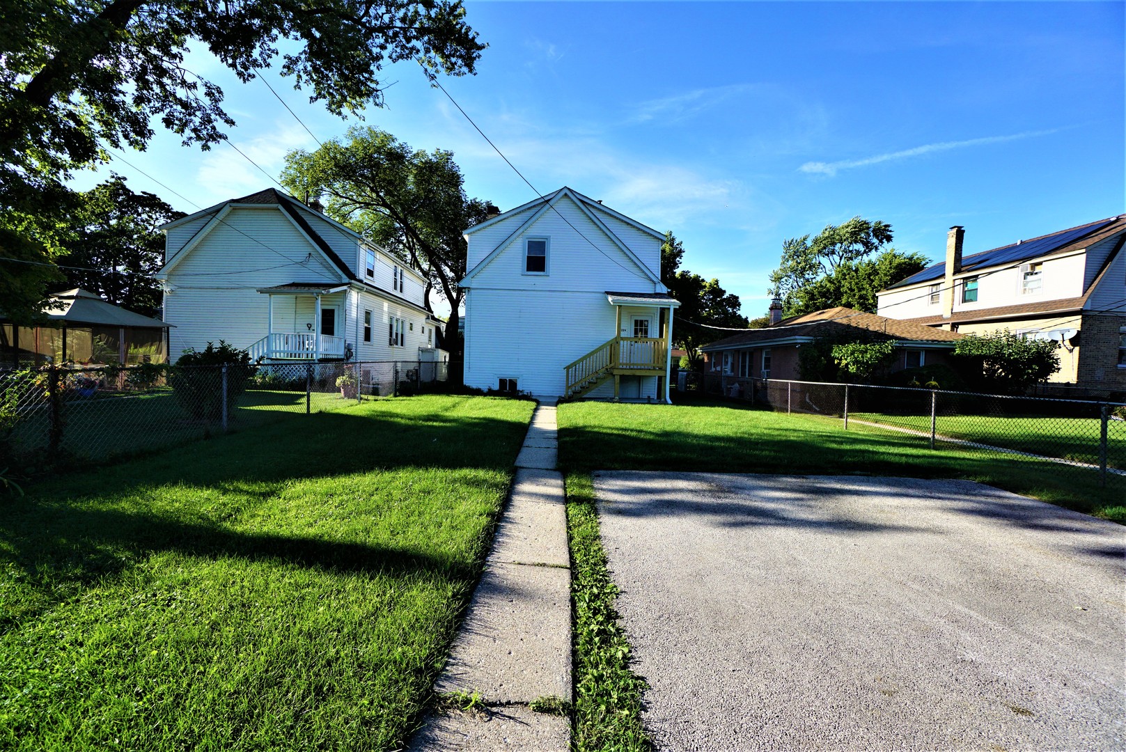 2224 Foster Street Evanston, IL 60201 - Photo 37 of 39 a front view of a house with a yard and garage