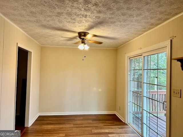 1366 Zebulon Road Griffin, GA 30224 - Photo 3 of 12 a view of empty room with wooden floor and fan