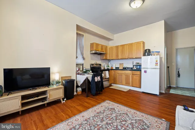 a view of a kitchen with washer and dryer