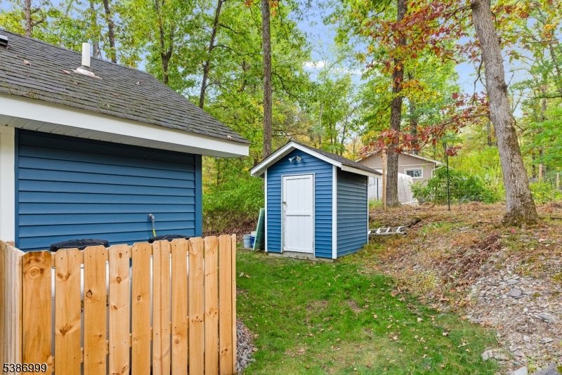 21 Lake Road Newton, NJ 07860 - Photo 12 of 18 a backyard of a house with lots of green space