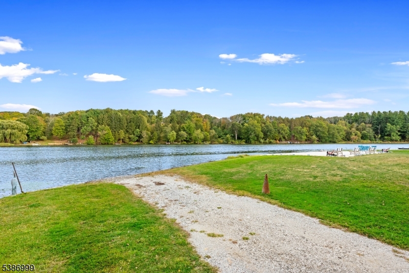21 Lake Road Newton, NJ 07860 - Photo 14 of 18 a view of a lake with a big yard