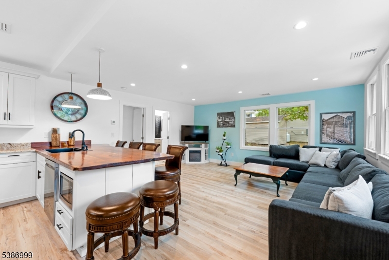 21 Lake Road Newton, NJ 07860 - Photo 3 of 18 a living room with granite countertop furniture and a large window