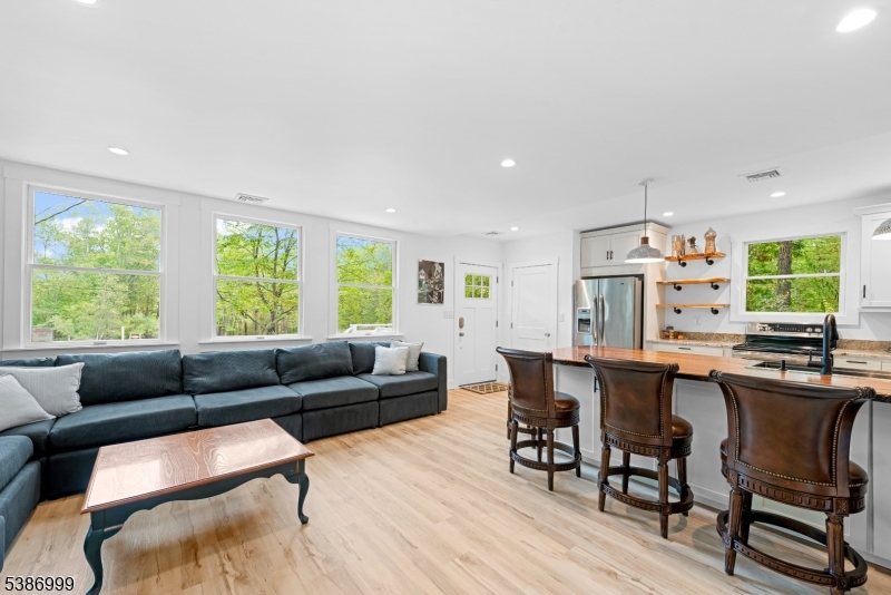 21 Lake Road Newton, NJ 07860 - Photo 4 of 18 a living room with furniture and a large window