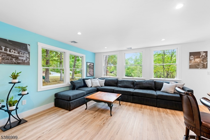 21 Lake Road Newton, NJ 07860 - Photo 5 of 18 a living room with furniture and a large window