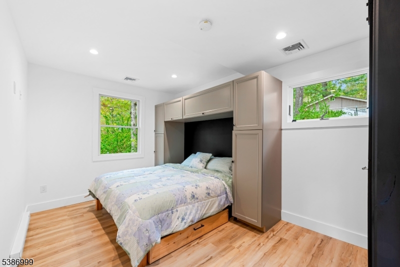 21 Lake Road Newton, NJ 07860 - Photo 8 of 18 a bedroom with a bed and a window