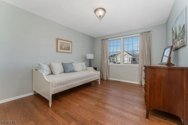 a front view of a house with outdoor seating