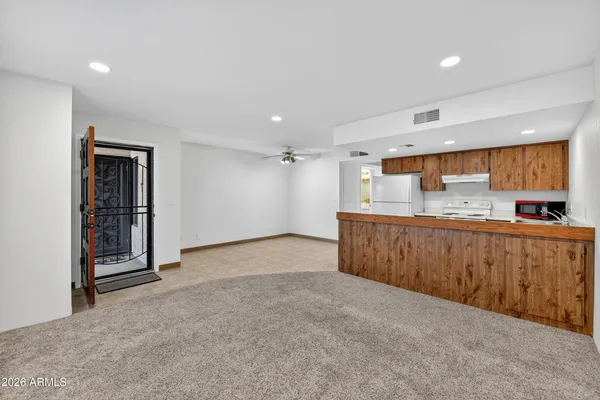 a view of a kitchen with a sink