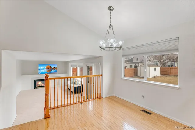 a view of a livingroom with stair