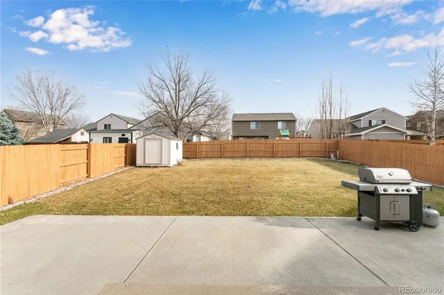 a view of a house with a snow in a yard
