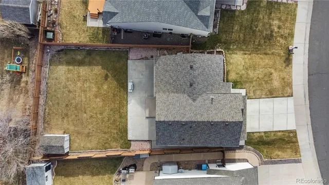 a aerial view of a house with swimming pool