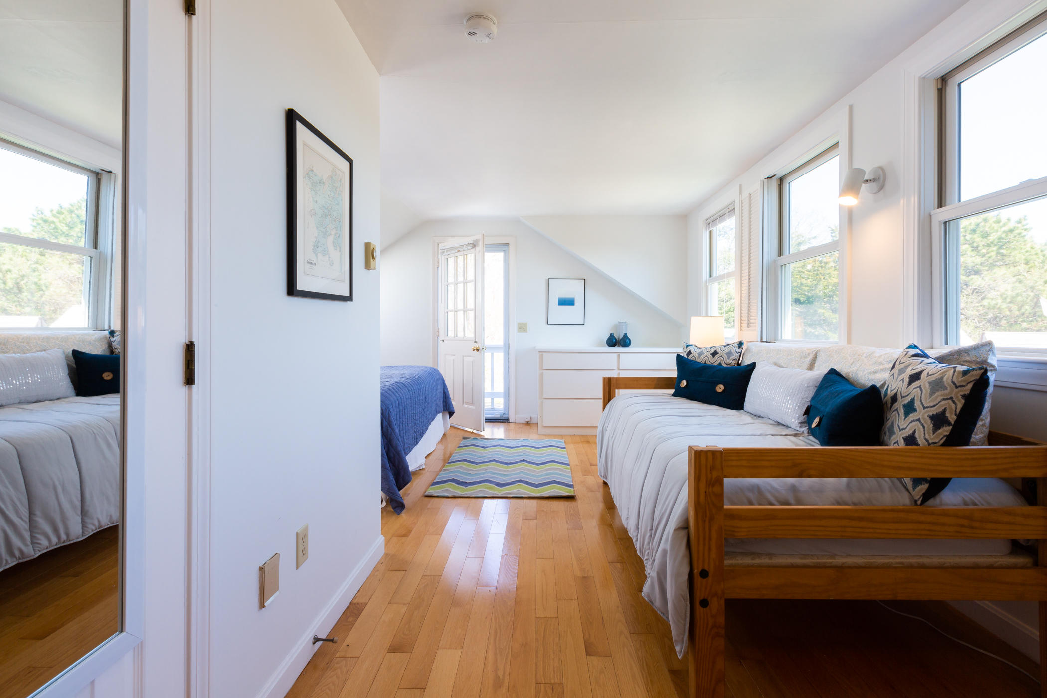 185 Beach Road Orleans, MA 02653 - Photo 15 of 24 a bedroom with two beds and a large window