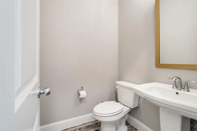 a bathroom with a sink and a toilet