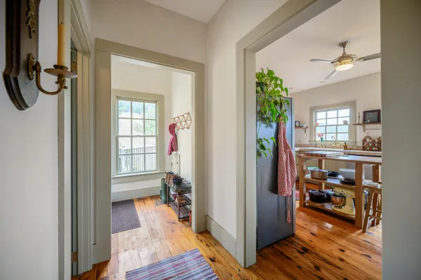 a bathroom with a sink mirror toilet and shower