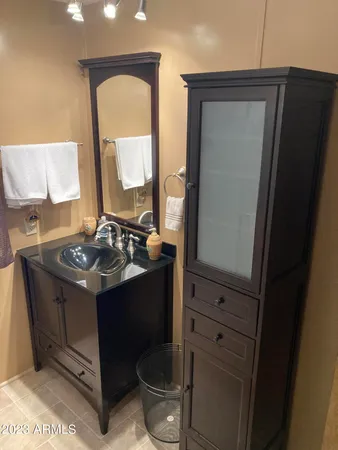 a view of a house with a yard and garage