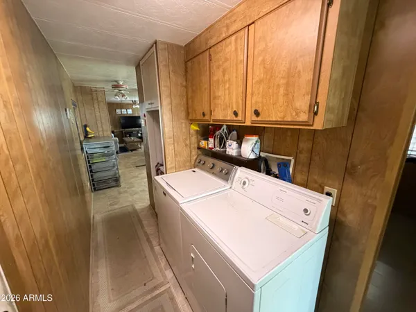 a view of a backyard with sitting area