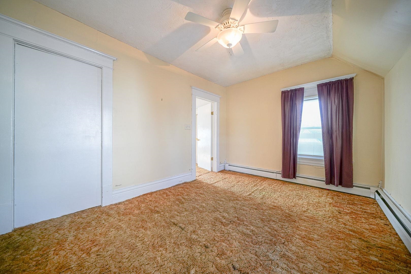 408 South 5th Street Oregon, IL 61061 - Photo 36 of 43 a view of an empty room with chandelier fan