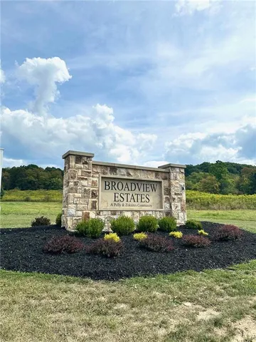 a front view of a building with retail shops