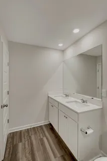 a bathroom with a sink a toilet and a bathtub