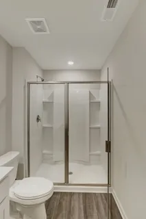 a view of a yard with large trees