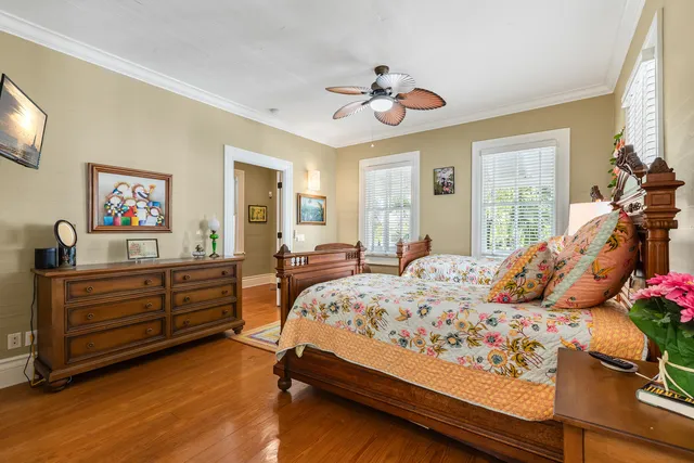 a hallway with paintings on the wall