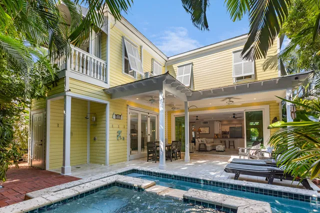 a view of kitchen and utility room with washer and dryer