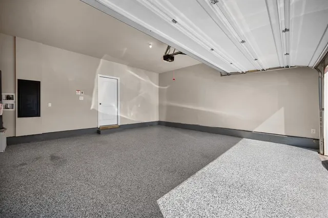 a view of an empty room with a fireplace