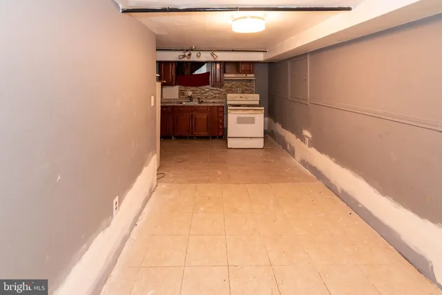 a view of a kitchen with a sink