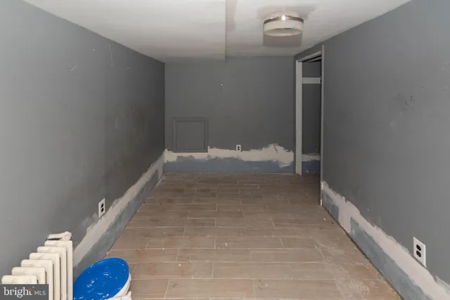 a bathroom with a sink and shower