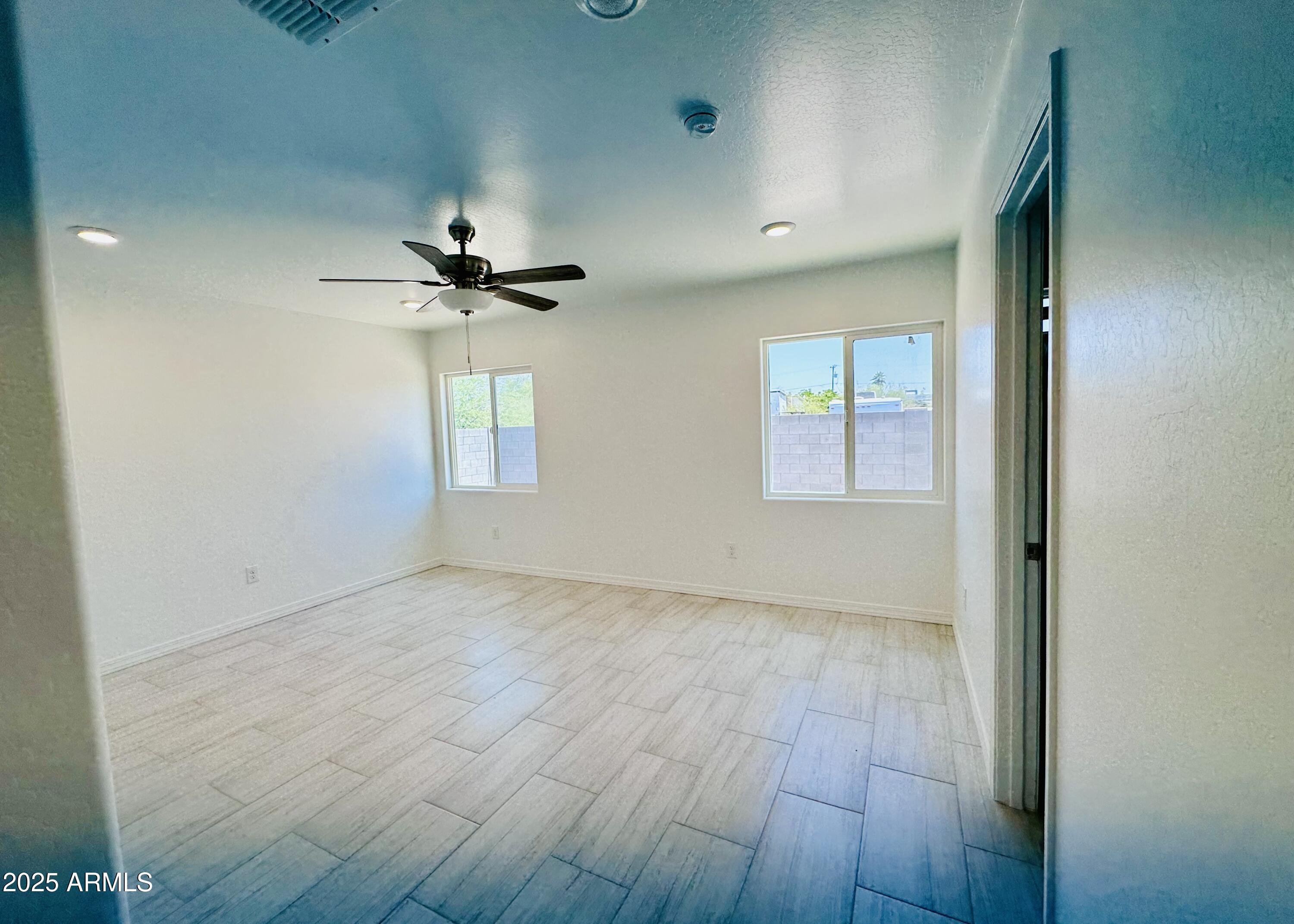 32007 North Bush Street Wittmann, AZ 85361 - Photo 14 of 22 a view of an empty room with a window