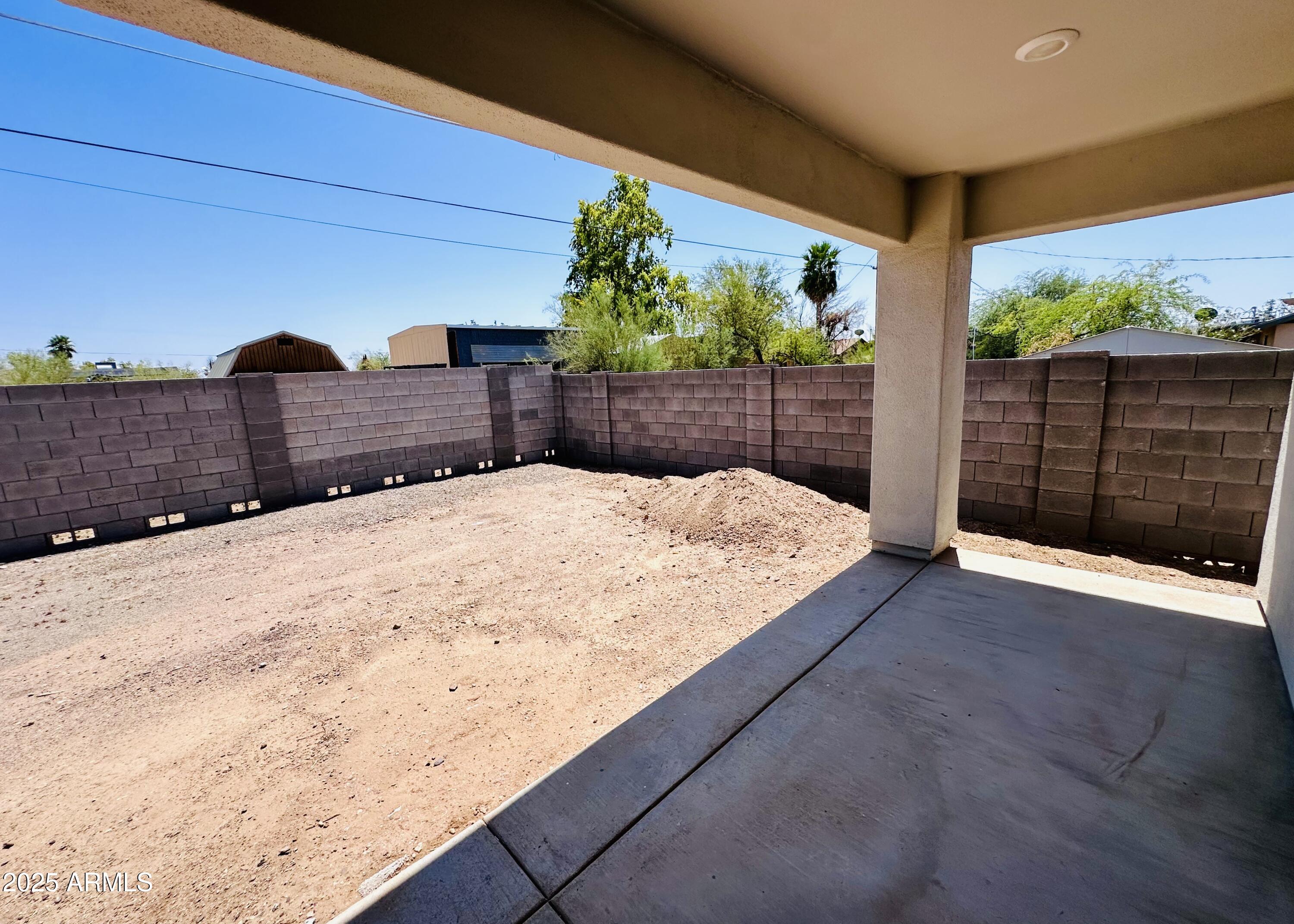 32007 North Bush Street Wittmann, AZ 85361 - Photo 19 of 22 a view of a backyard
